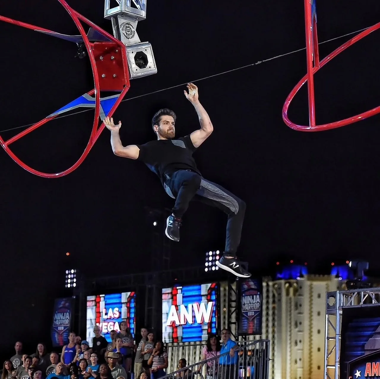 Tyler Gillett flying between obstacles above the crowd in Las Vegas